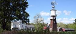 brick tower with windmill on top